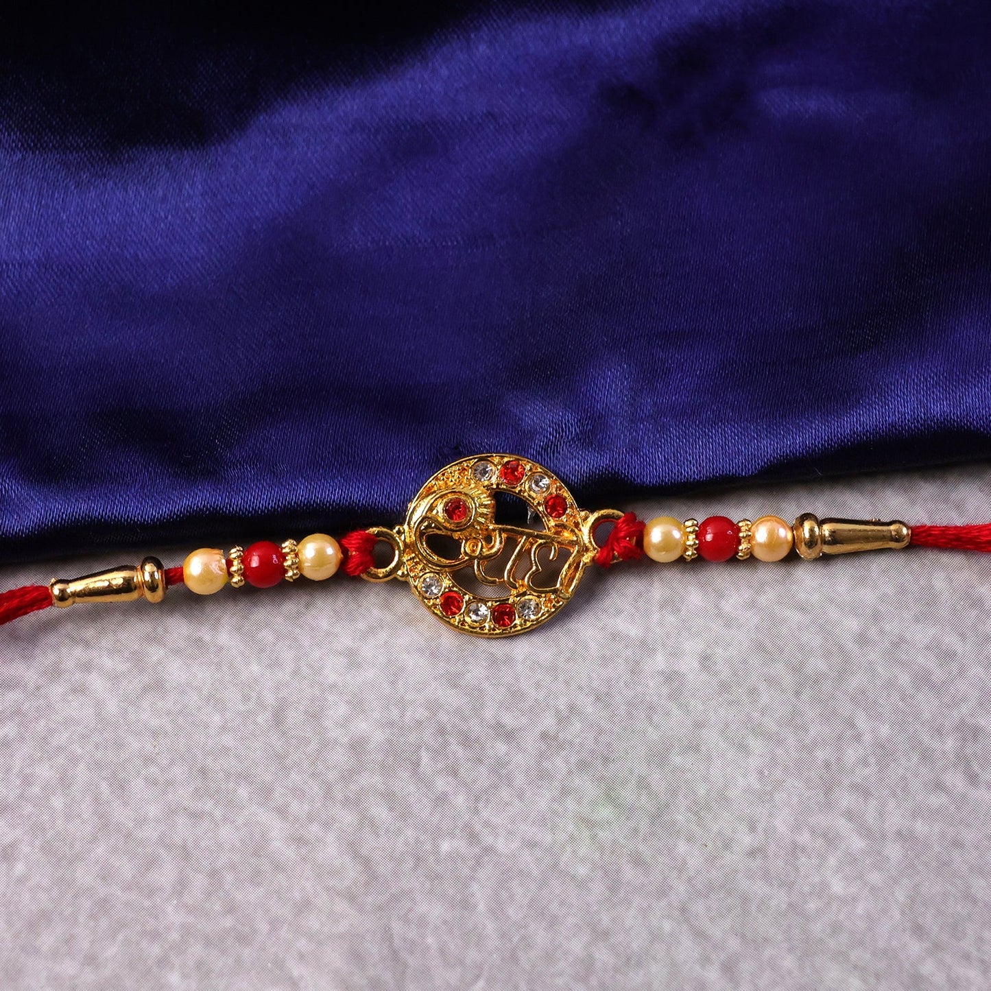 Radhe Rakhi displayed with vibrant background for celebration