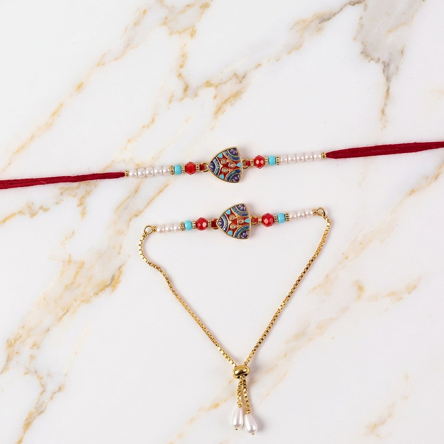 Top view of triangle-shaped pearl Rakhi