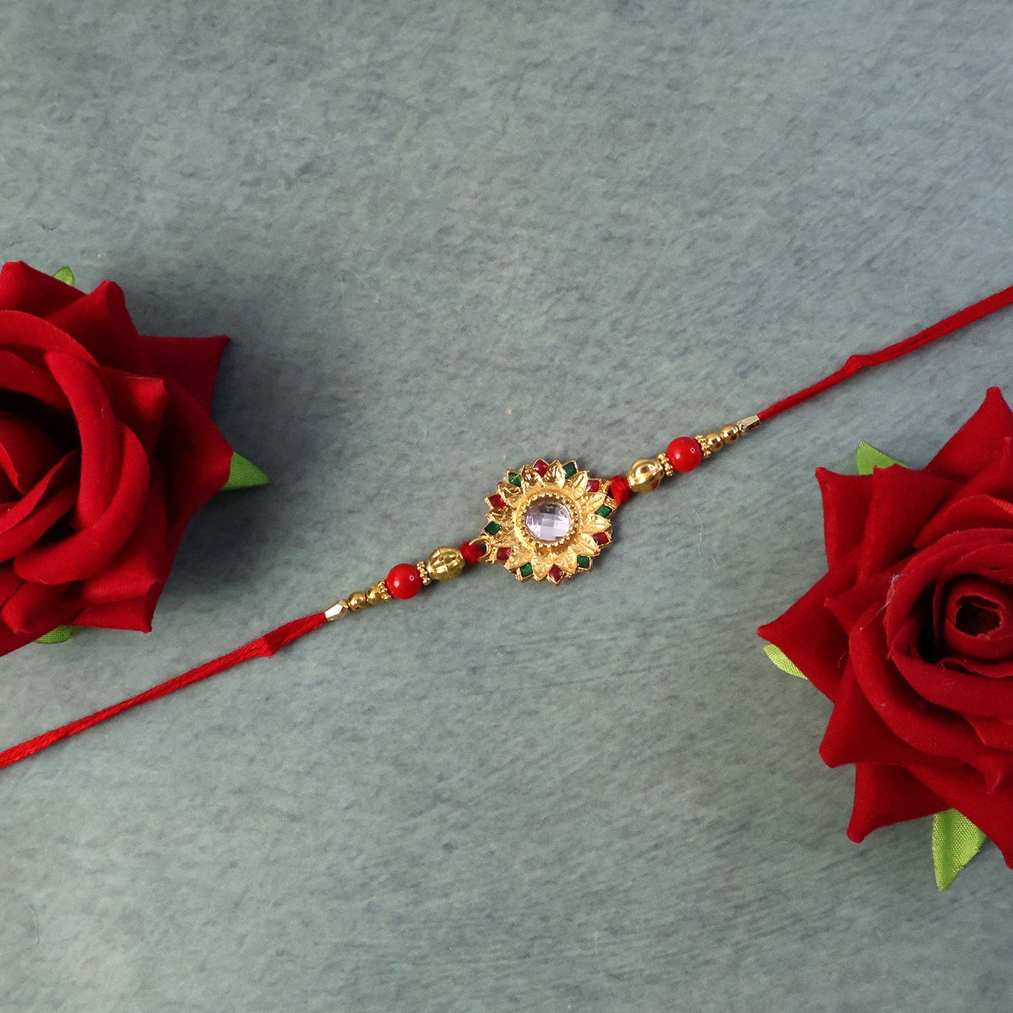 Top view of Rakhi showing beadwork and design details