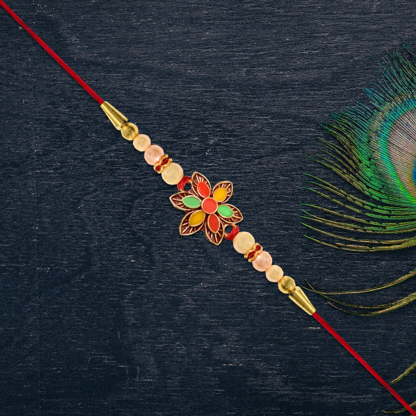 Floral Bead Rakhi tied comfortably on brother's wrist showing vibrant colours