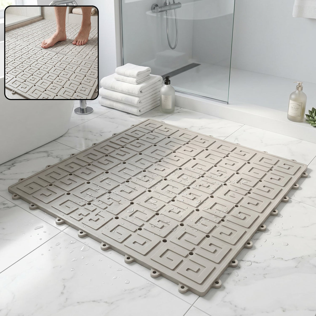 Grey non-slip bathroom mat with textured surface and drainage holes for safety in wet areas