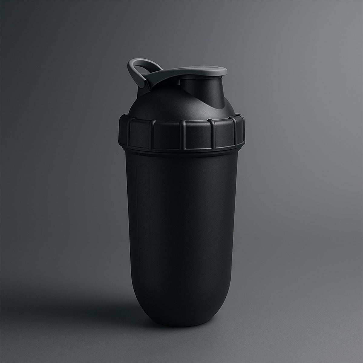 A black shaker bottle with a grey lid and handle is centered on a dark grey background.