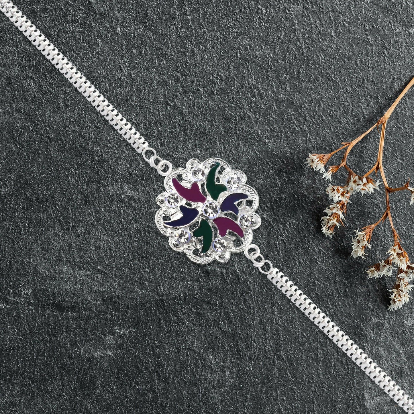 Handcrafted multi-strand floral enamel Rakhi bracelet symbolizing sibling love