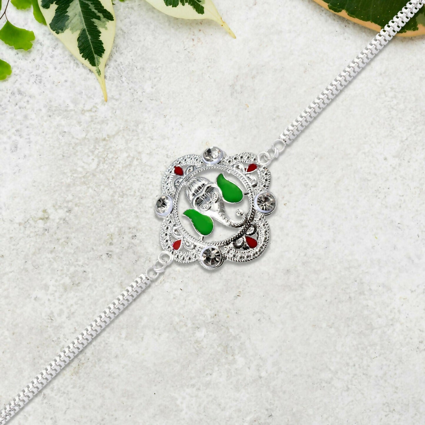 Silver rakhi display featuring elegant motifs symbolizing love and protection.