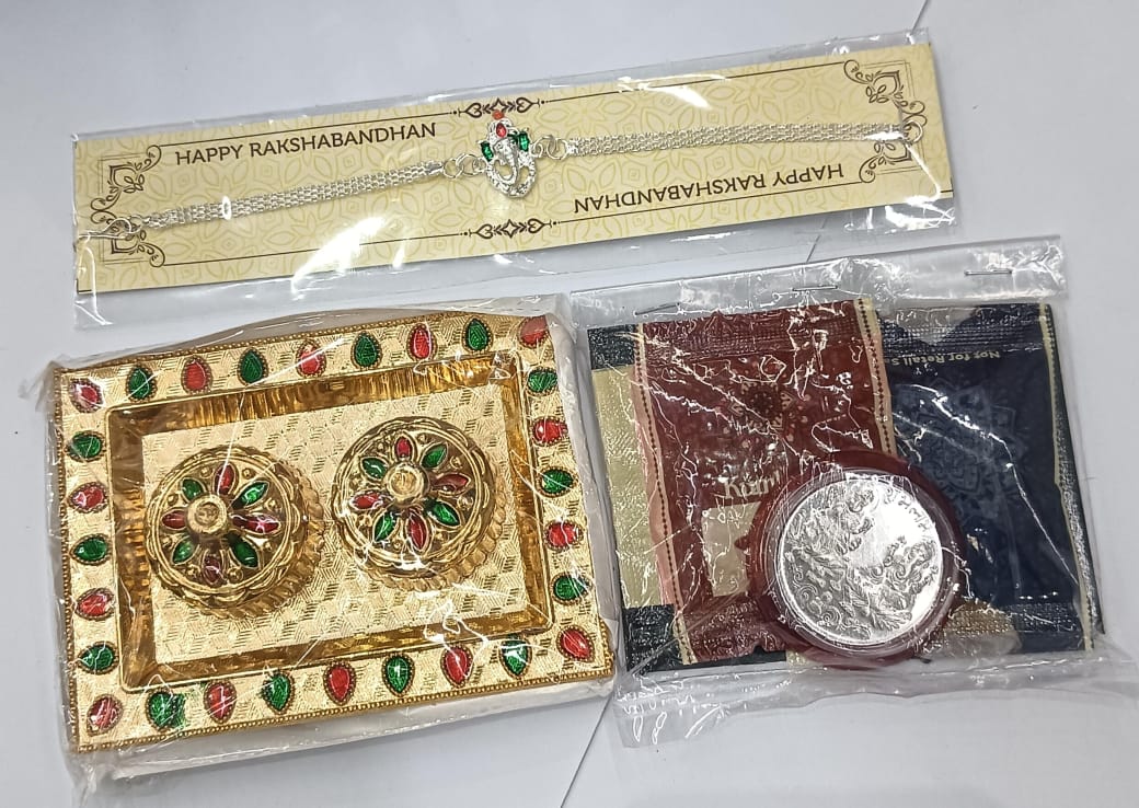 Complete spiritual Rakhi combo with Ganesh bracelet and sweets