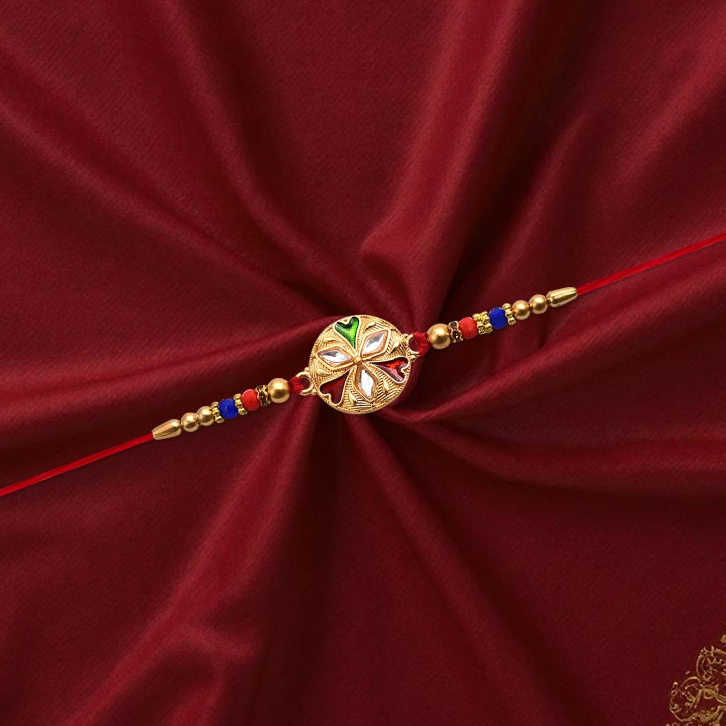 Golden Rakhi tied on a brother's wrist, celebrating the Raksha Bandhan festival.