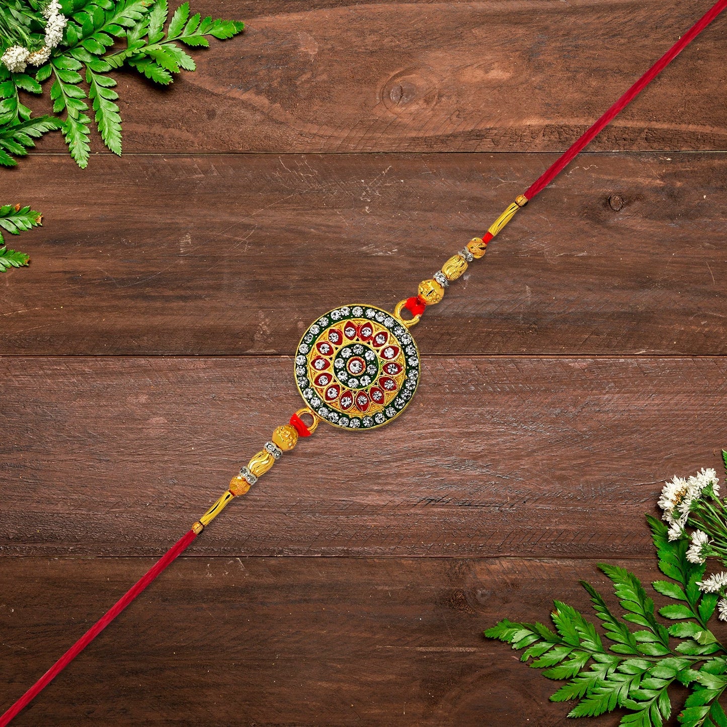 Detailed view of Royal Designer Rakhi showcasing bright kundan centerpiece
