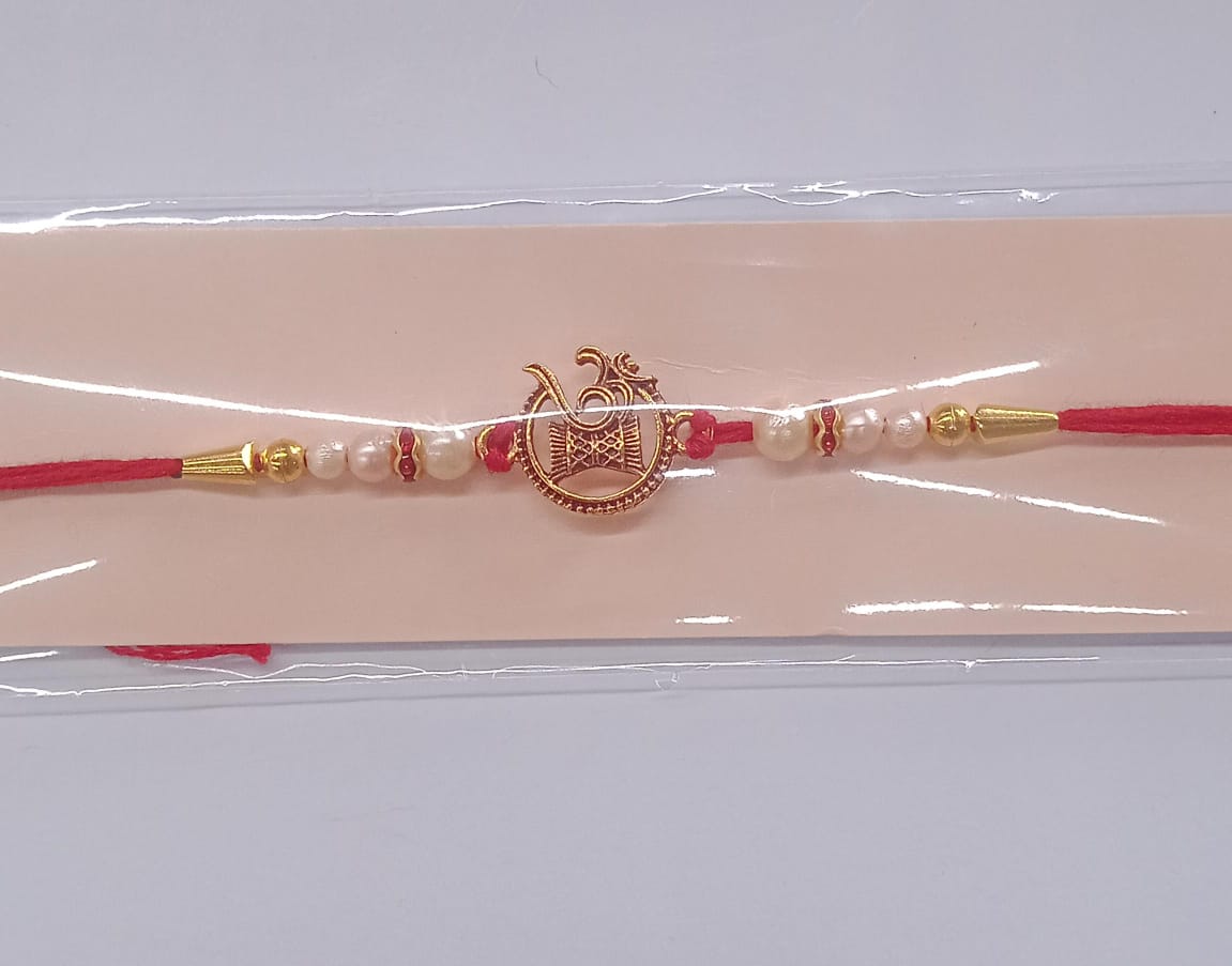 Traditional Om Swastik Rakhi with golden accents for Raksha Bandhan