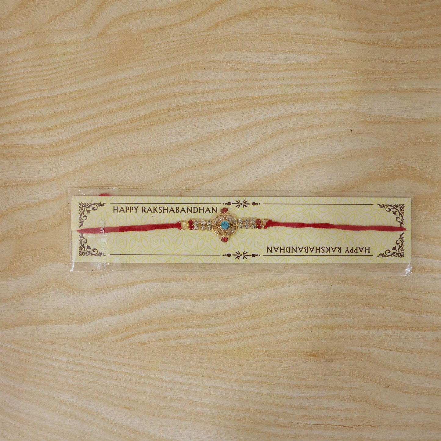 Elegant blue floral Kundan Rakhi suitable for Raksha Bandhan