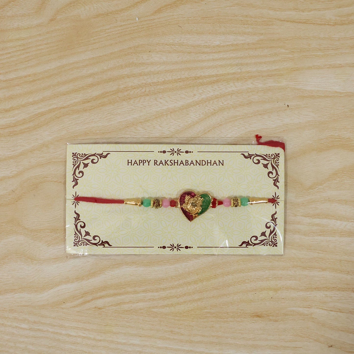 Full view of designer Lord Ganesha Rakhi for Raksha Bandhan celebration