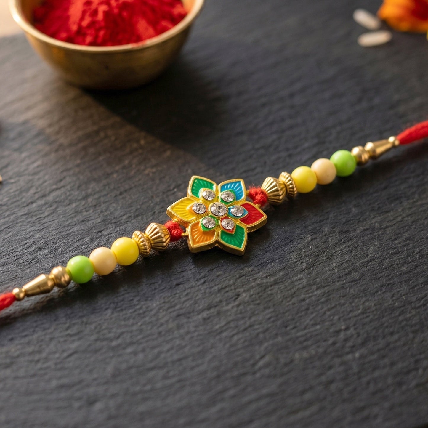 Designer Rakhi with floral motifs and soft threading