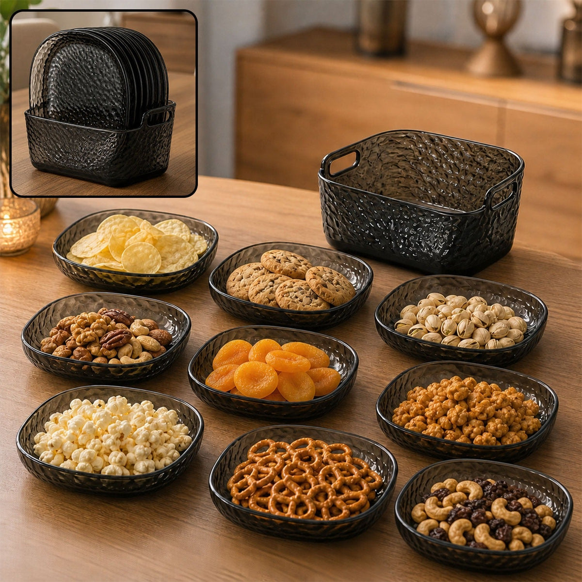 Nine dark gray textured glass snack bowls filled with various snacks, arranged around a matching storage basket on a wooden