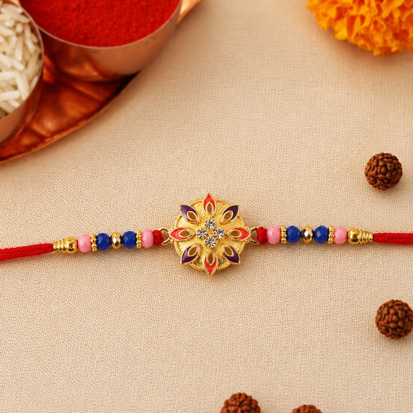 Decorative beads floral Rakhi on white background