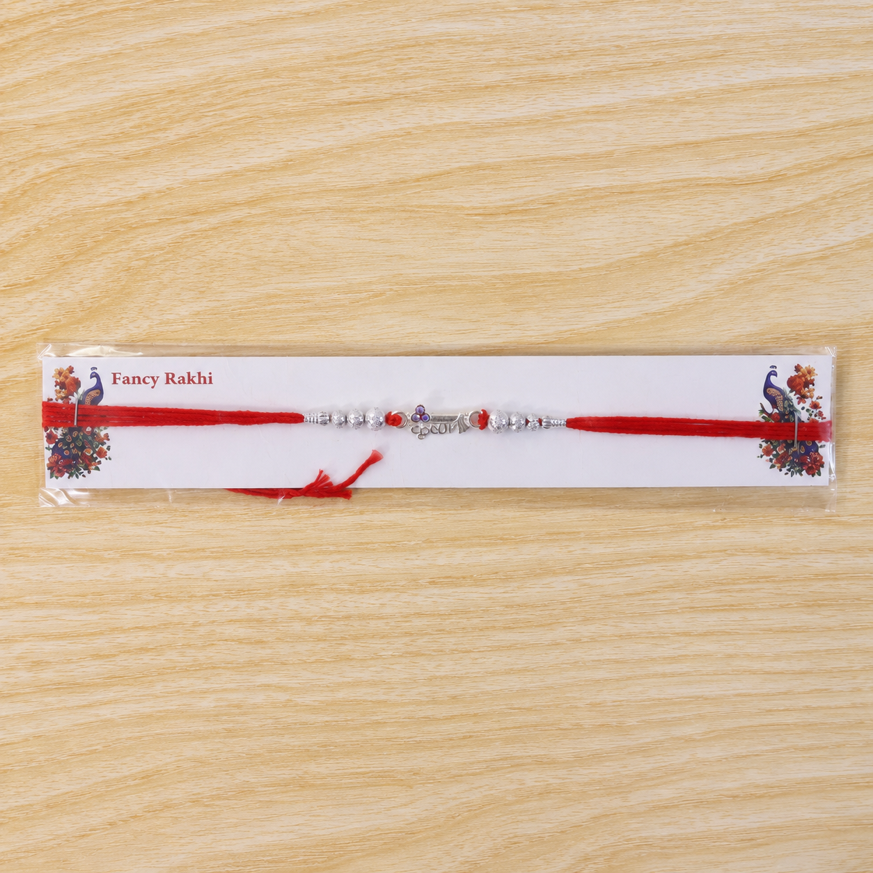 Premium silver rakhi with detailed finishing, perfect for Raksha Bandhan celebrations