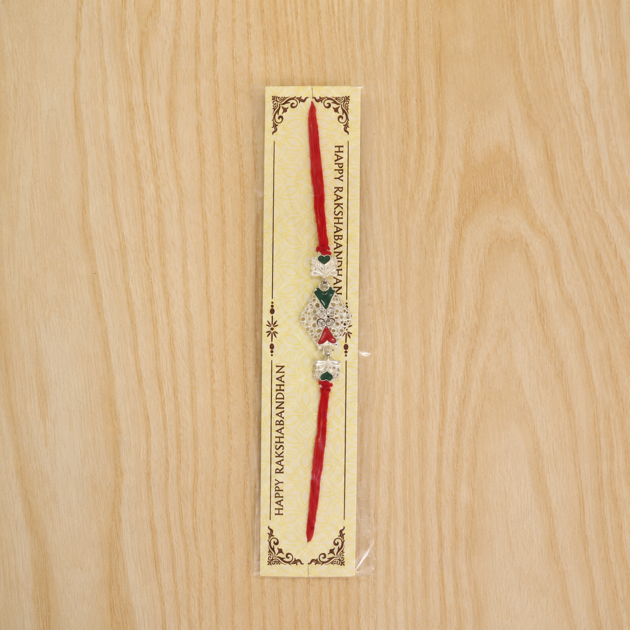 Stylish designer rakhi with elephant charm and festive decorations for Raksha Bandhan