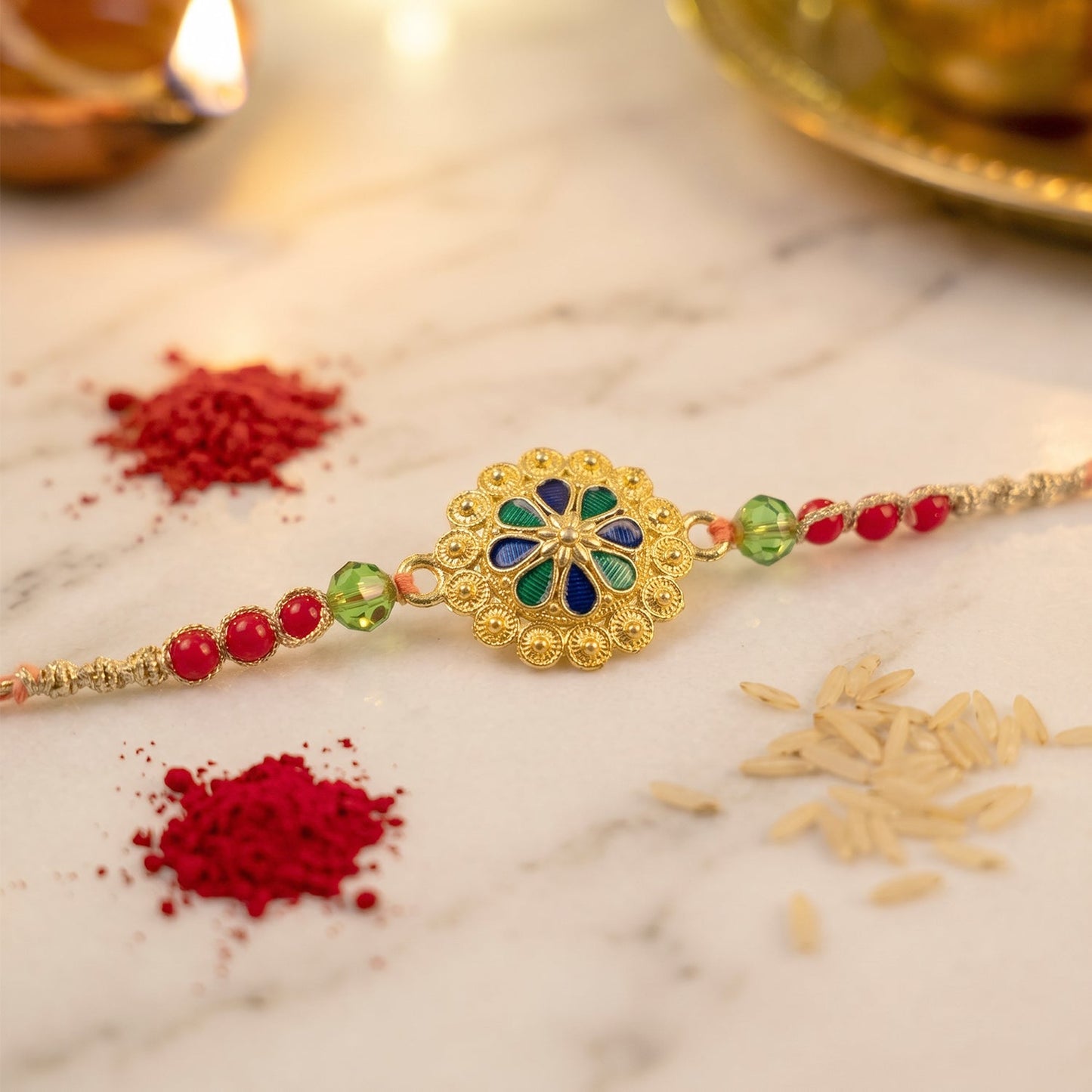 Elegant Gold Blue Flower Rakhi details with decorative elements