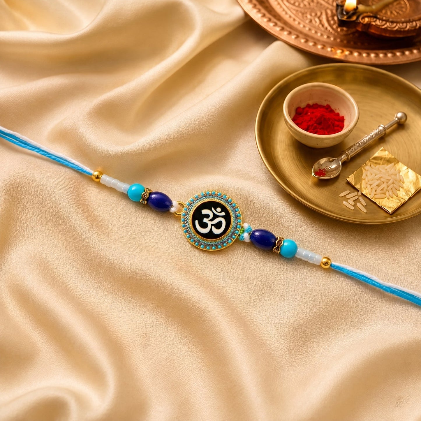Designer Rakhi with Om symbol and decorative beads