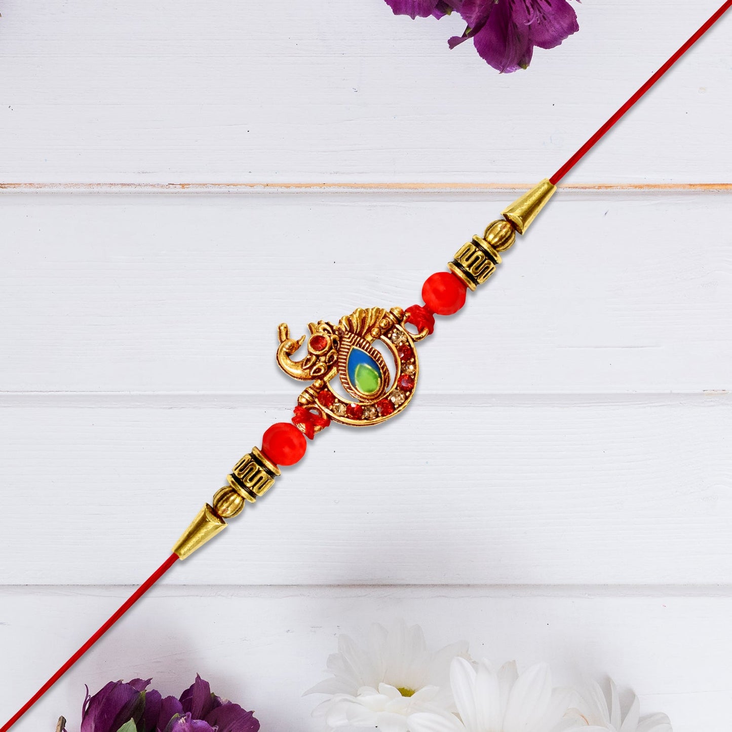 Close-up of Stone Studded Rakhi detailing craftsmanship and shining stones symbolizing sibling bond.