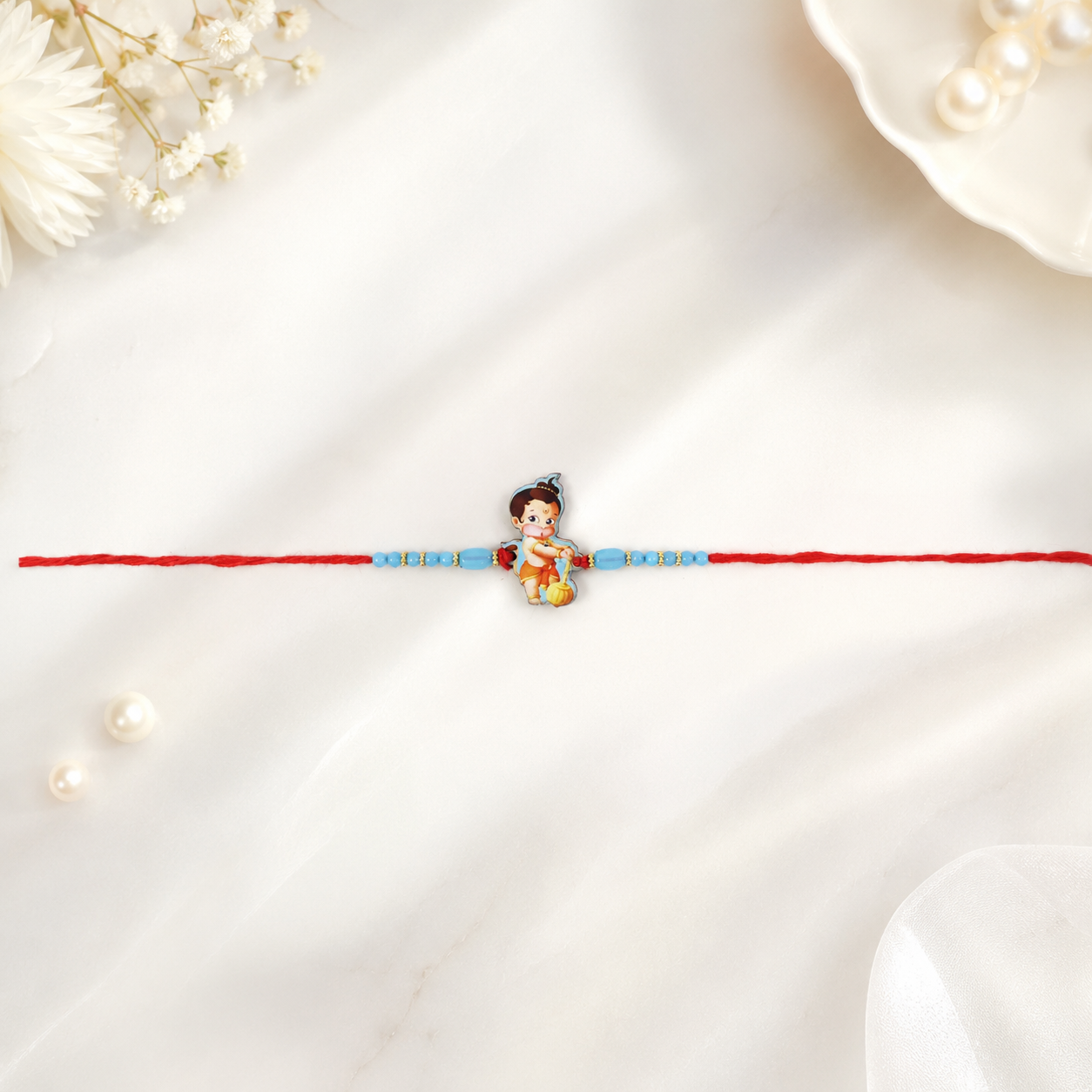 Red thread of Rakhi designed for comfortable wear.