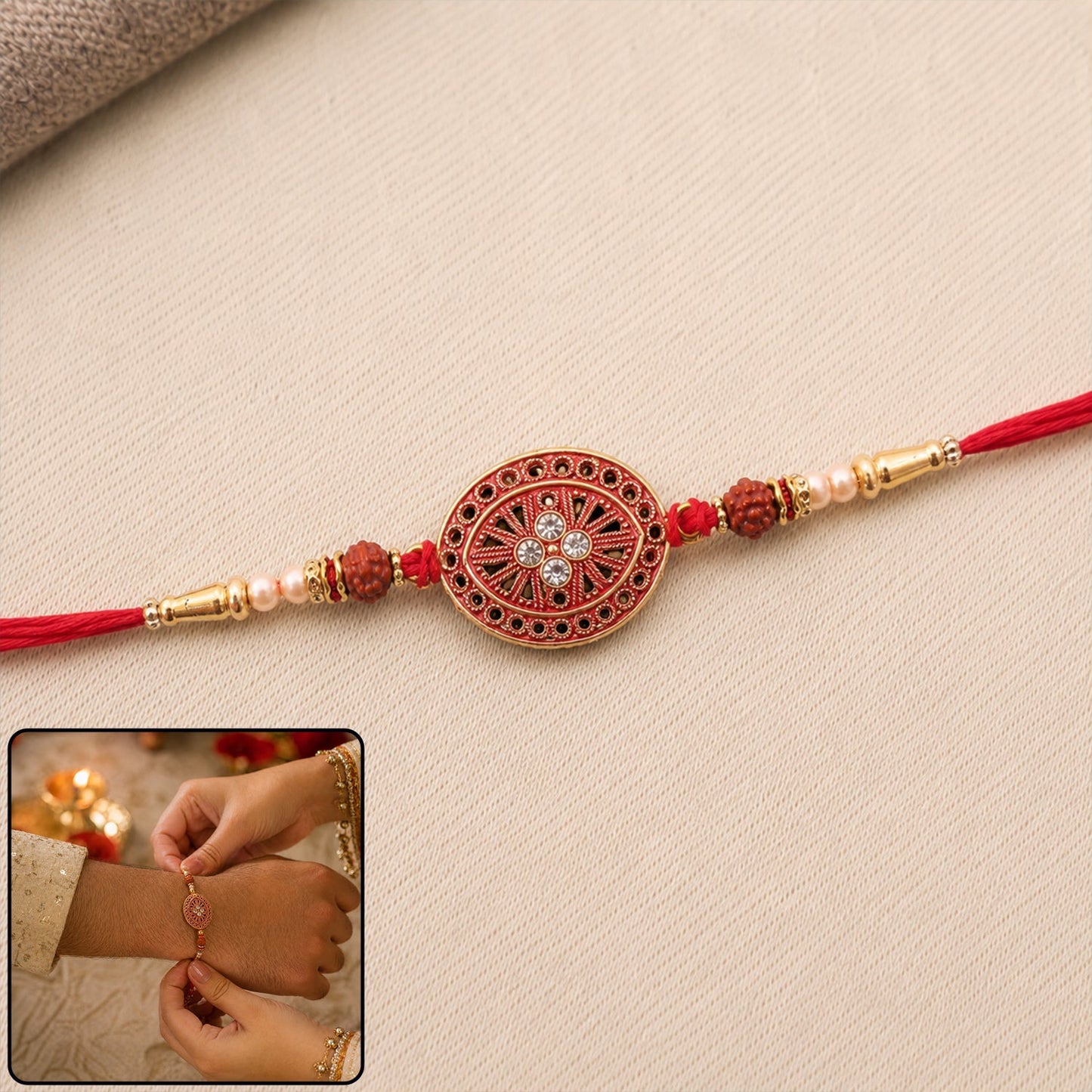 Red Chakra Rakhi with golden beads and pearl detailing as a festive brother gift