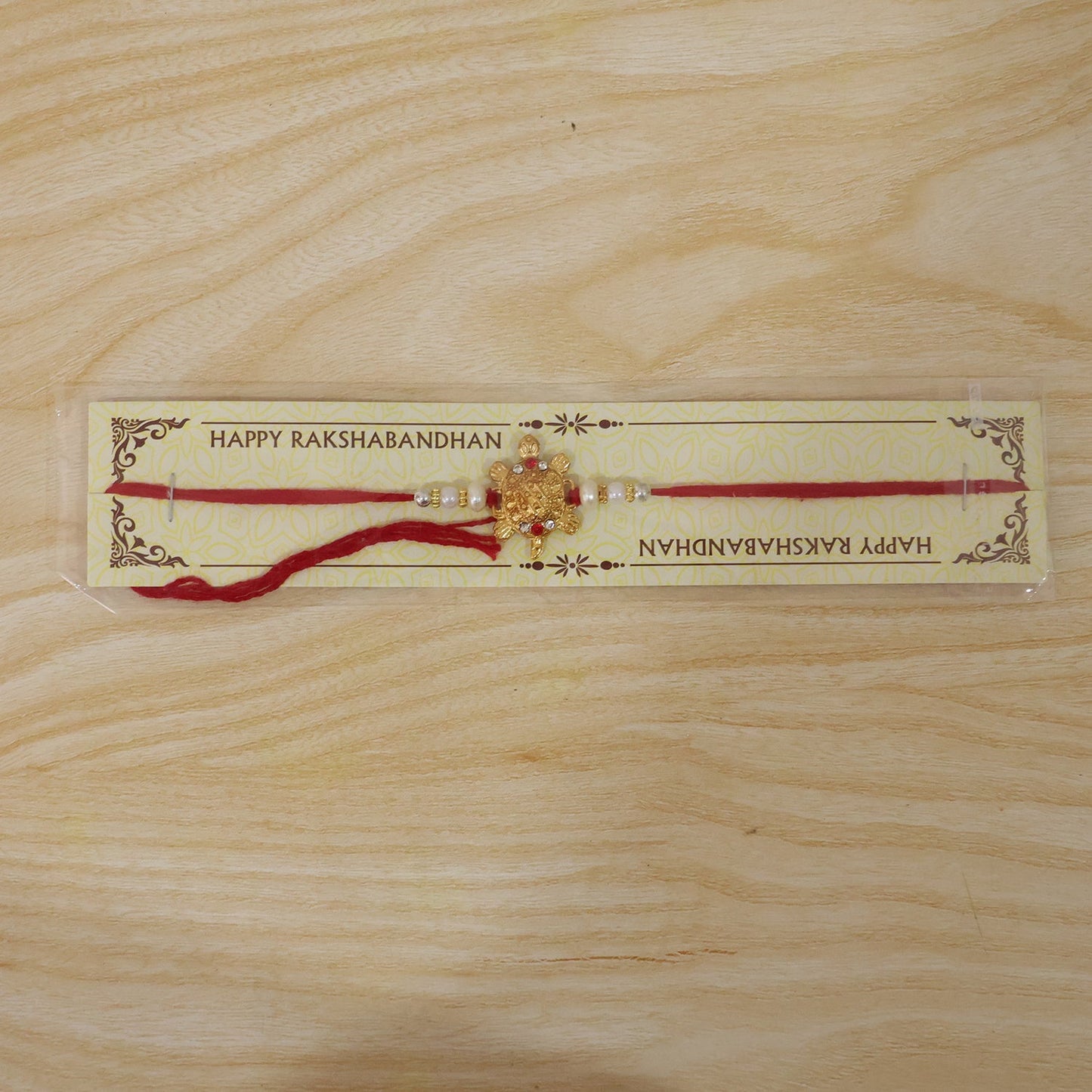 Full view of the Turtle Rakhi, symbol of good fortune for your brother.