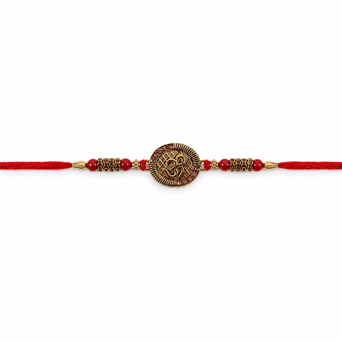 Flat lay of Om Coin Rakhi displaying the full design