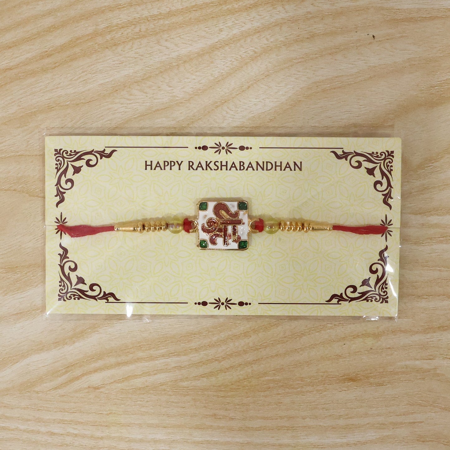 Display of Shree Symbol Square Rakhi with decorative elements