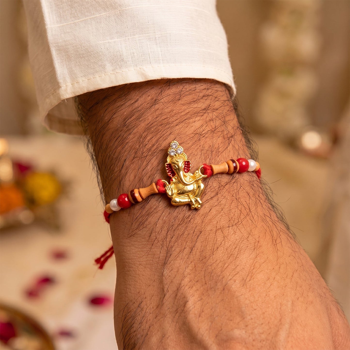 Traditional festive rakhi with attractive beadwork and lightweight thread design