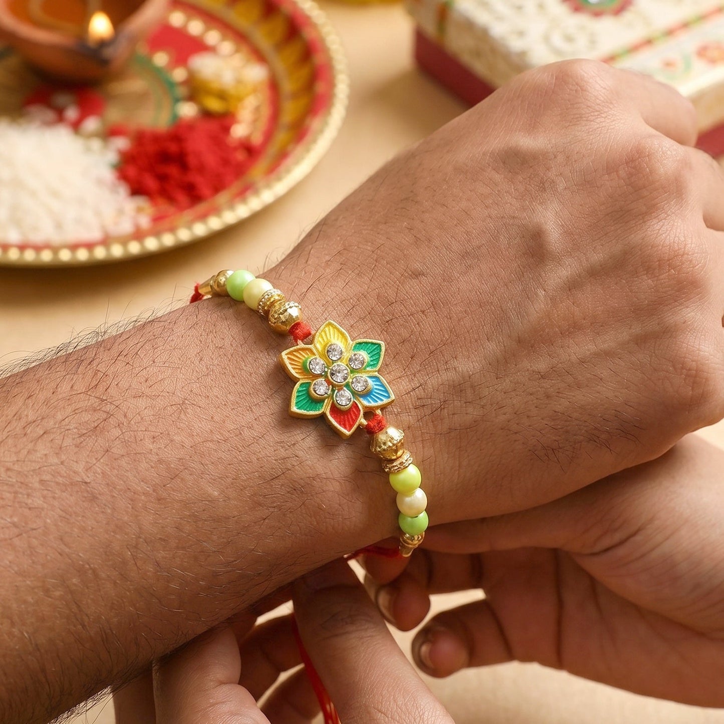 Colorful Kundan Rakhi with intricate design for brother