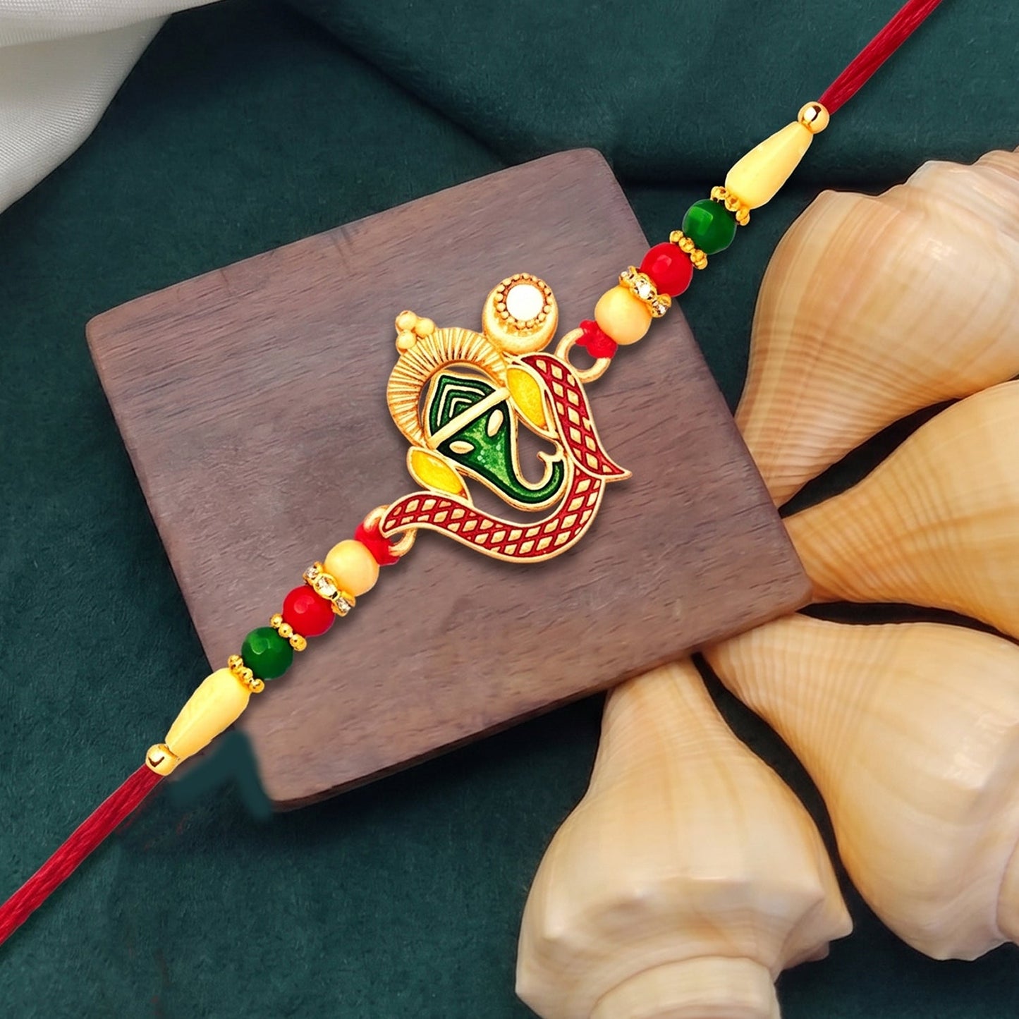 Ganpati Rakhi handcrafted with traditional design and premium materials