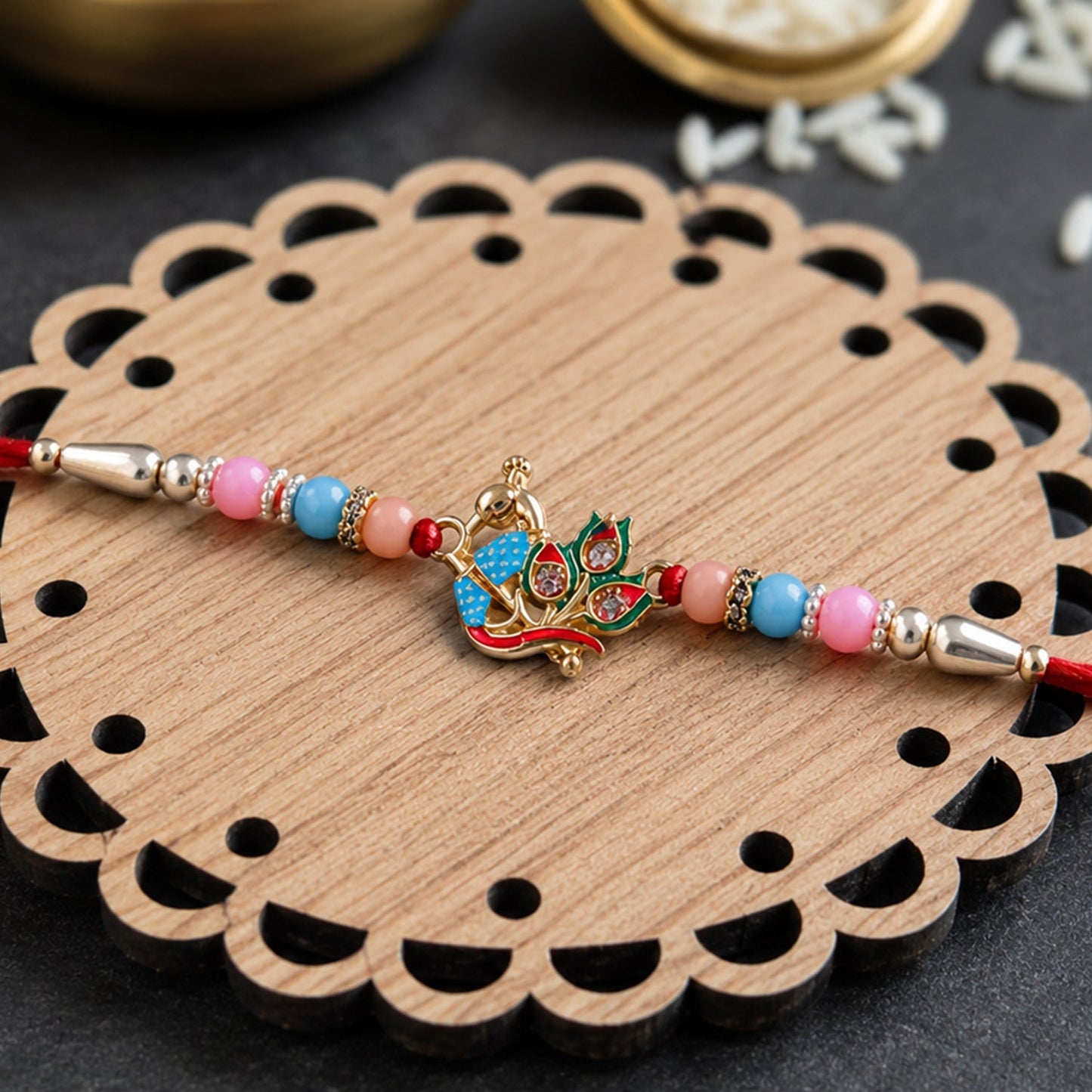 Premium peacock motif rakhi with multicolor beads for Rakshabandhan
