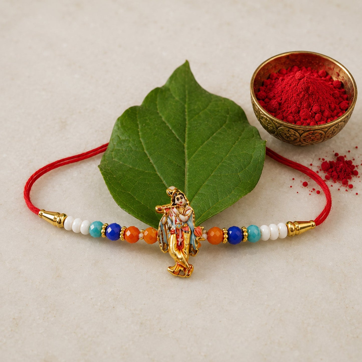Spiritual Rakhi with Lord Krishna idol and decorative beads for festival gifting