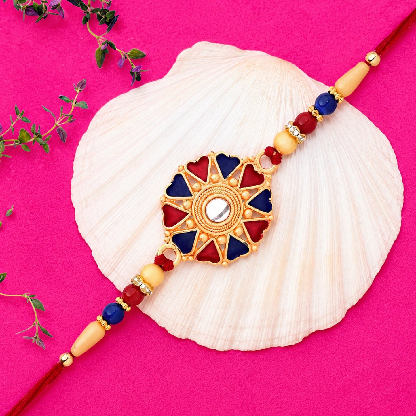 Close-up of a handcrafted traditional Rakhi with beads and vibrant threads.