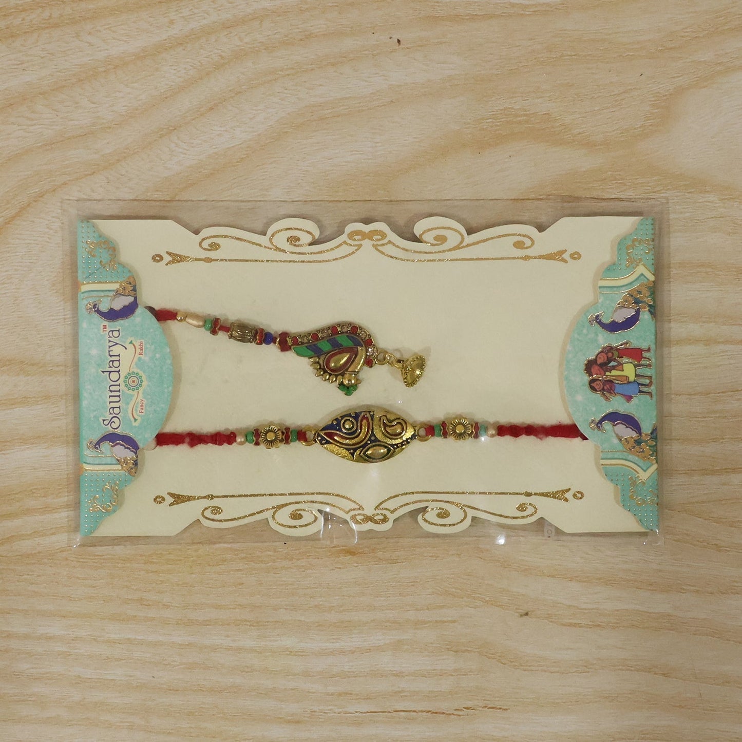 Side angle of colorful Rakhi with traditional peacock design