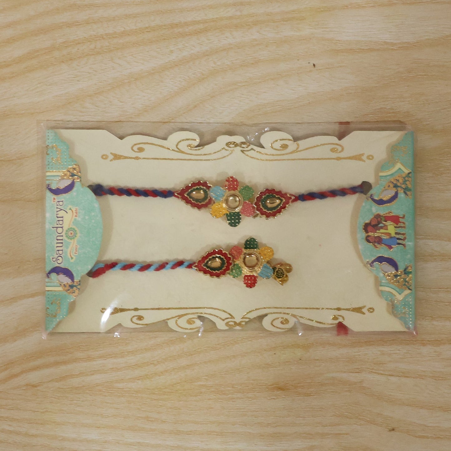 Decorative floral latkan on multicolor thread Bhabhi Rakhi