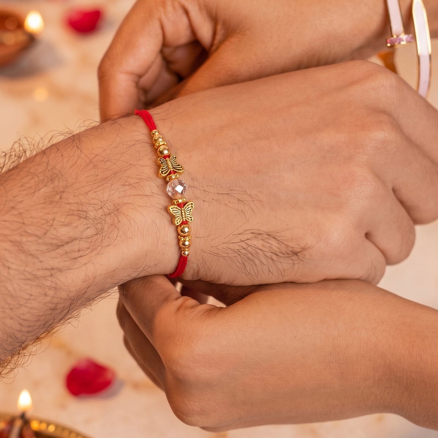 Details of gold latkan embellishment on Bhabhi Rakhi