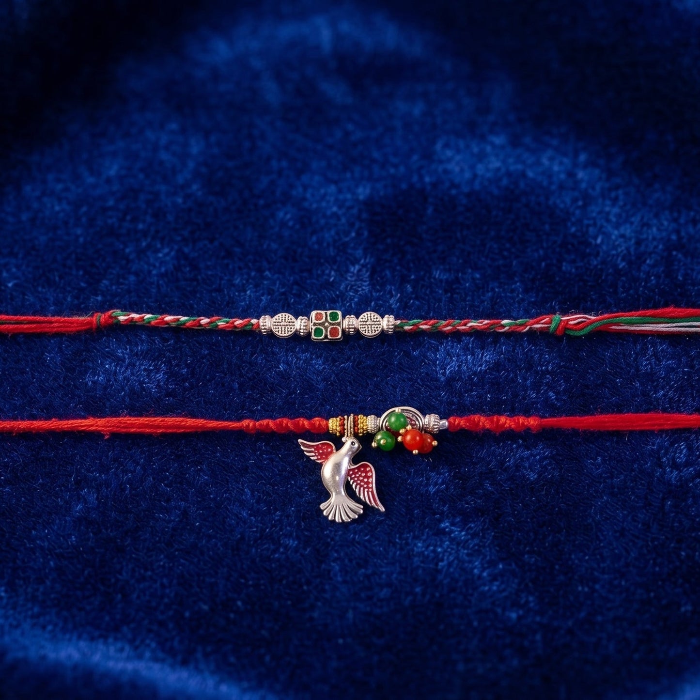 Front view of elegant floral Bhabhi Rakhi with red thread