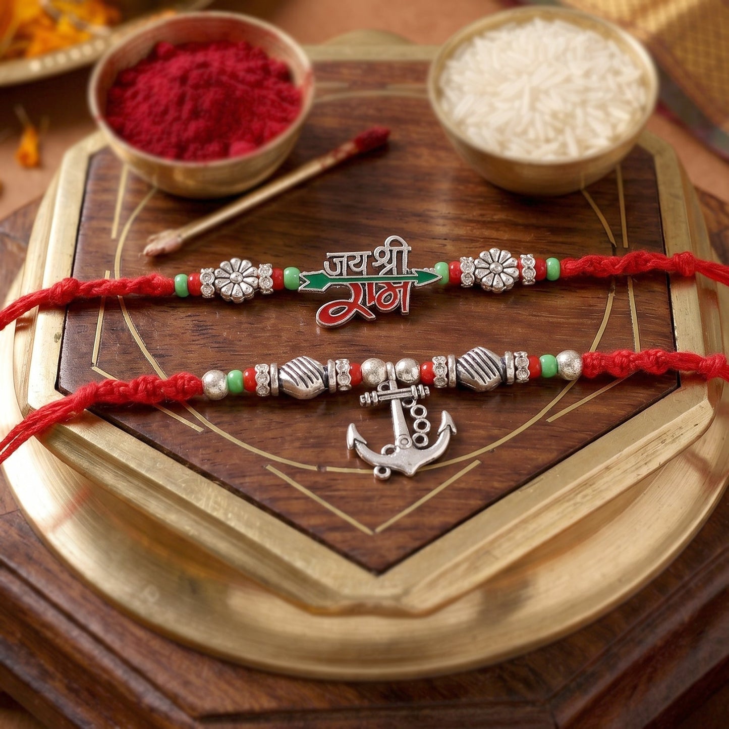 Close-up of Bhaiya Bhabhi Rakhi Pair with charms