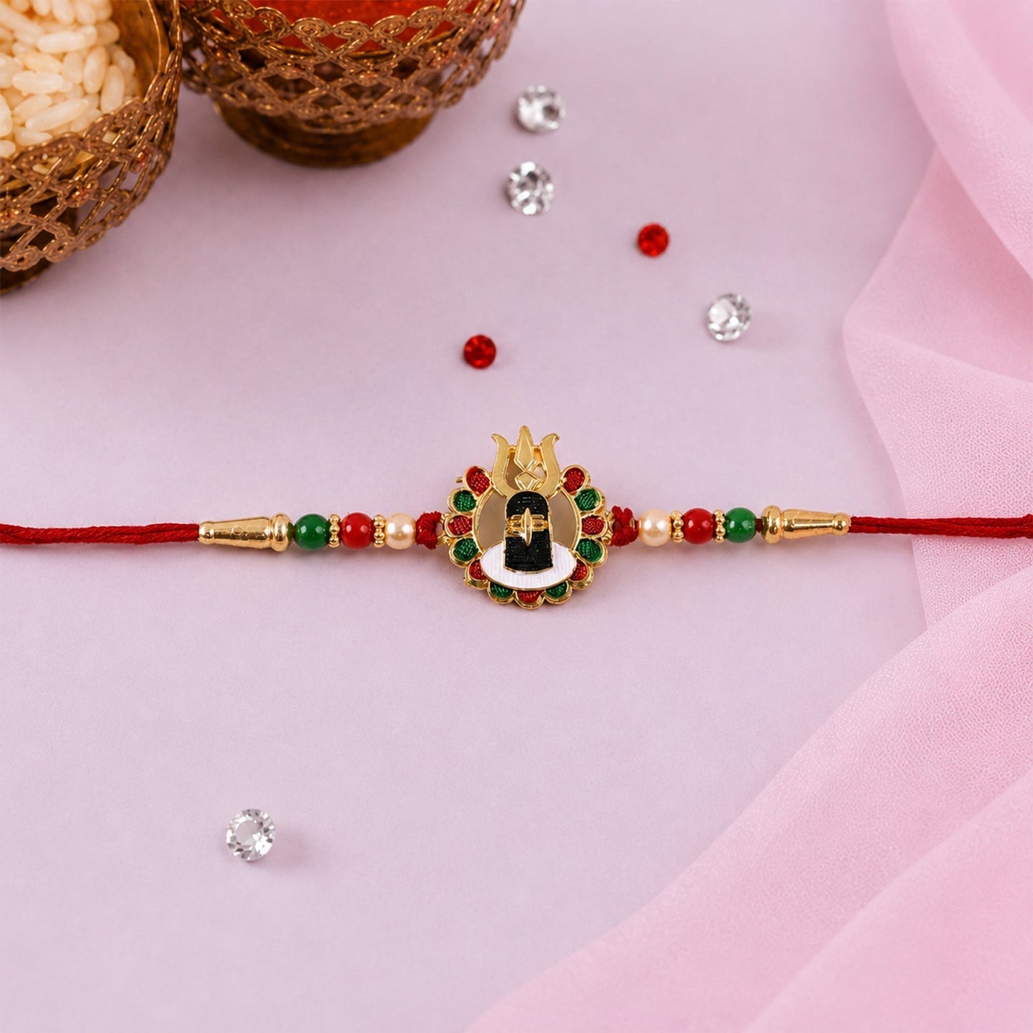Festive Shivling Design Rakhi with vibrant bead accents