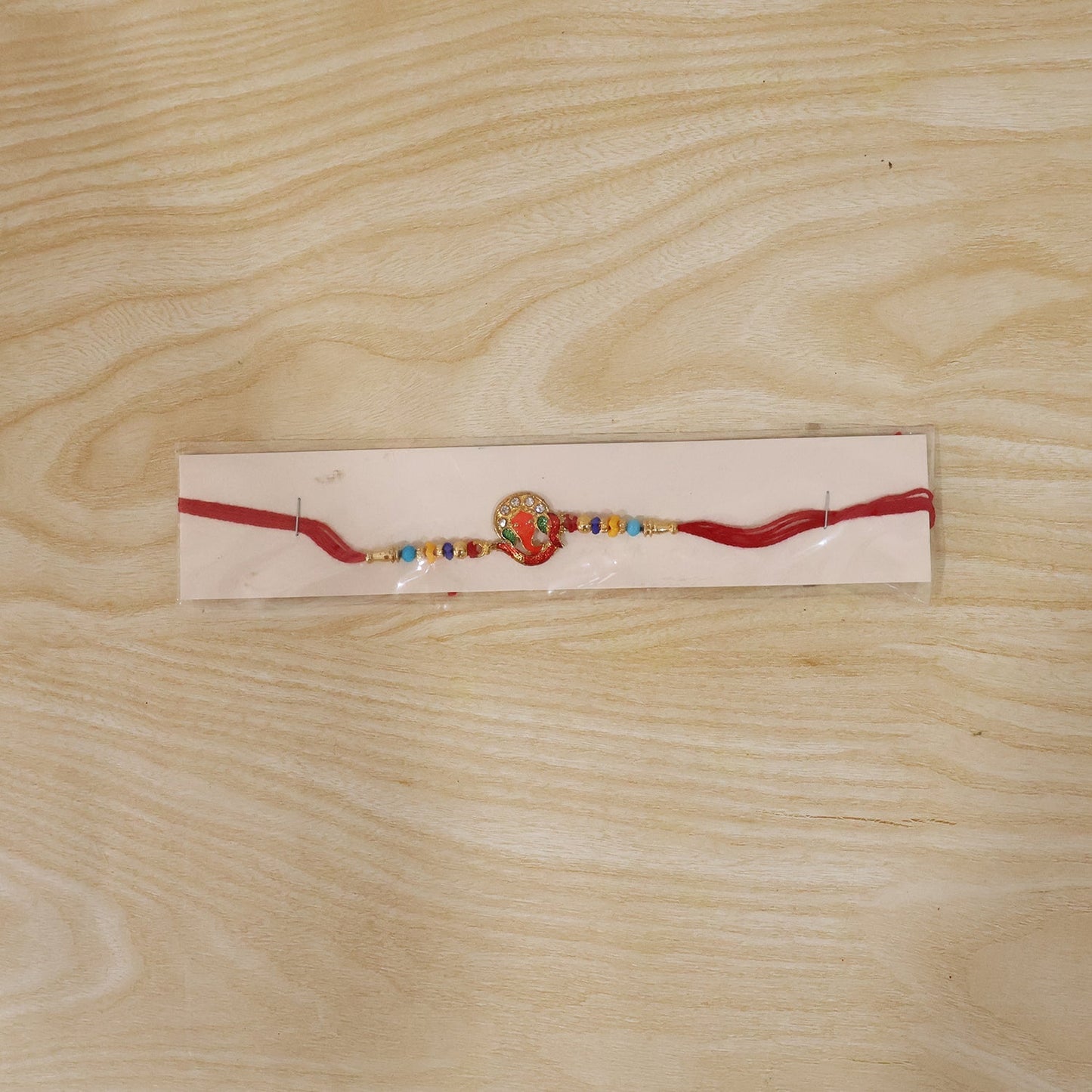 Full-length colorful Ganesh Rakhi for Raksha Bandhan