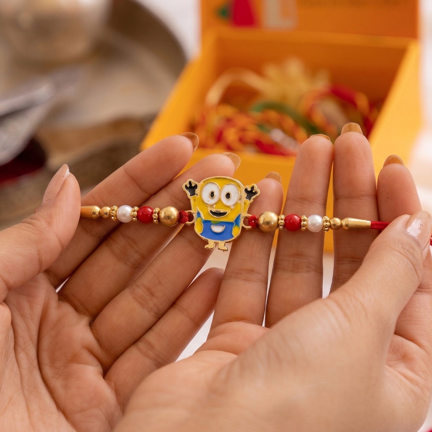 Brightly colored cartoon character Rakhi displaying bead details