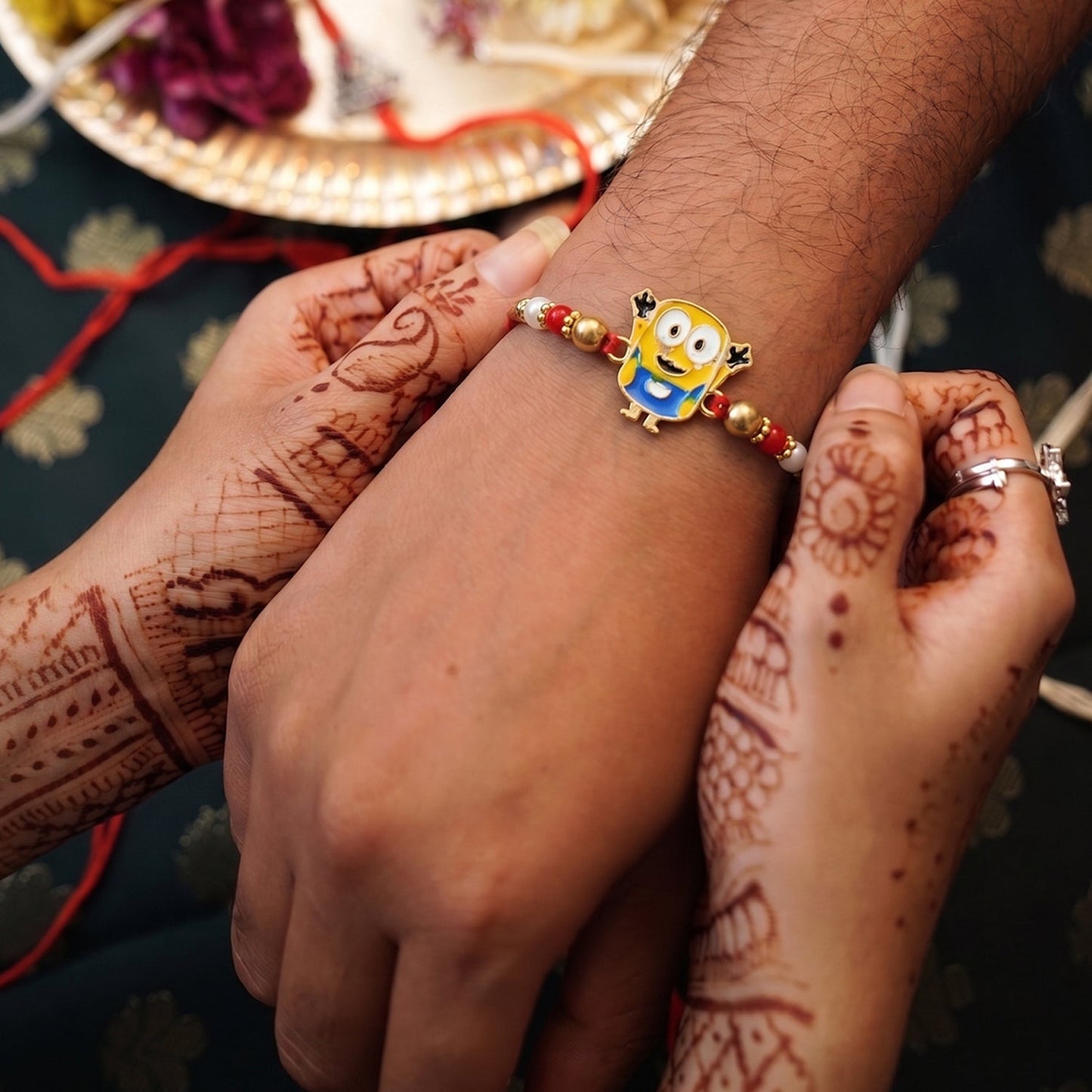 Close-up of cartoon character Rakhi with soft tying thread