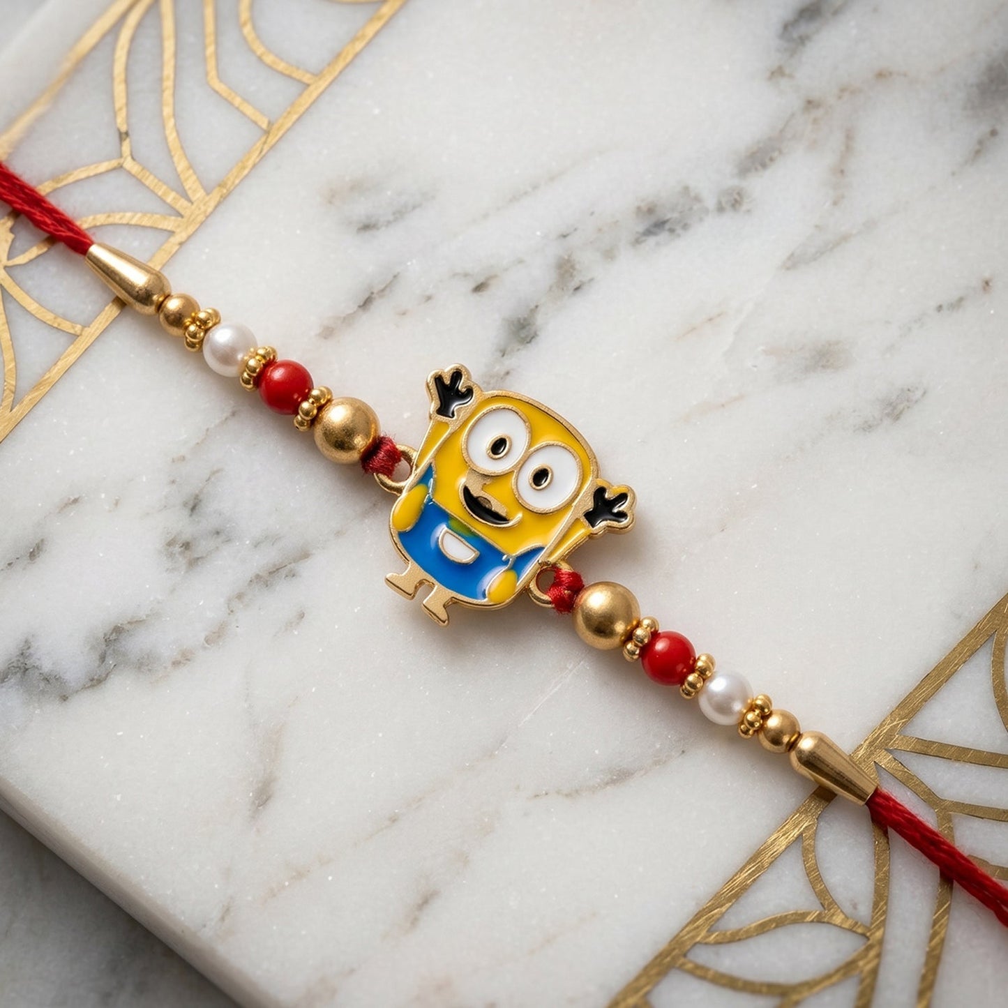 Decorative beads and centerpiece on cartoon character Rakhi