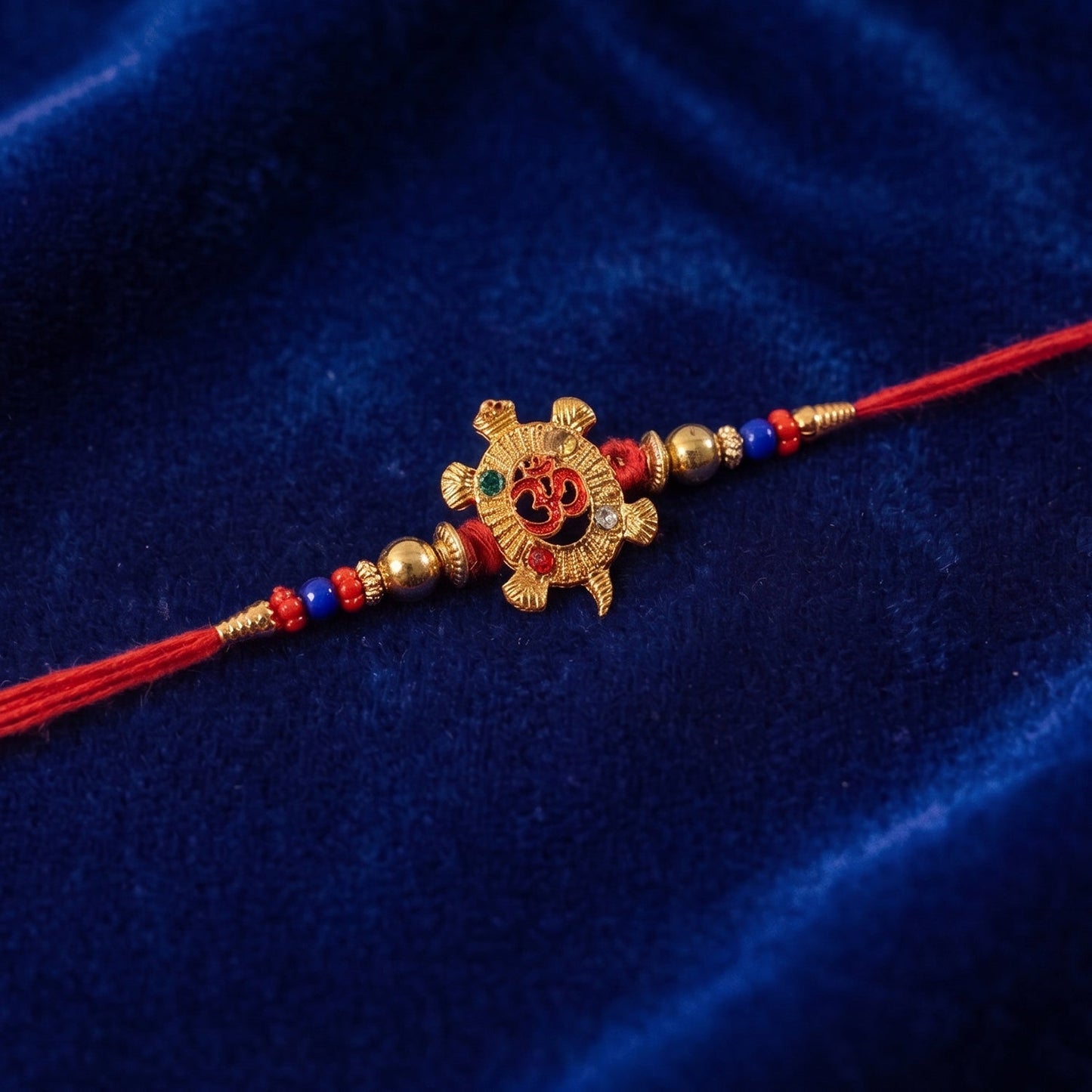 Rakhi styled on festive background with turtle motif