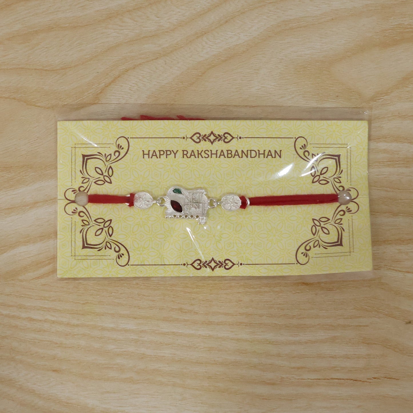 Festive Radha Krishna Rakhi for sibling gifting