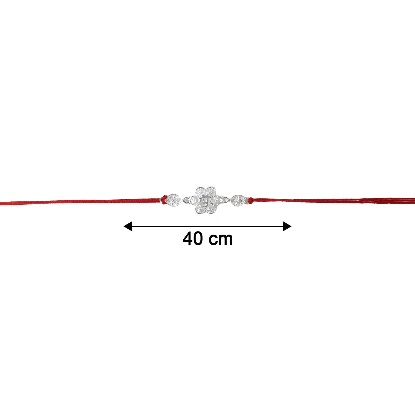Close-up of red thread tied to silver floral Om Rakhi