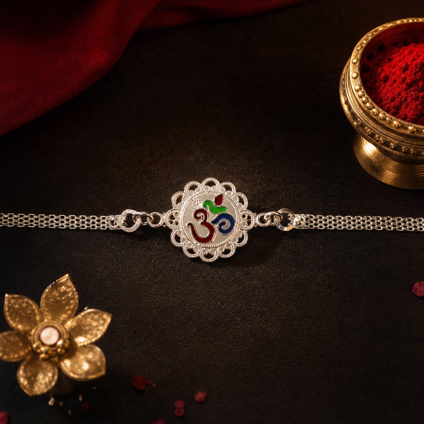 Designer silver Om chain Rakhi worn on wrist, stylish and traditional