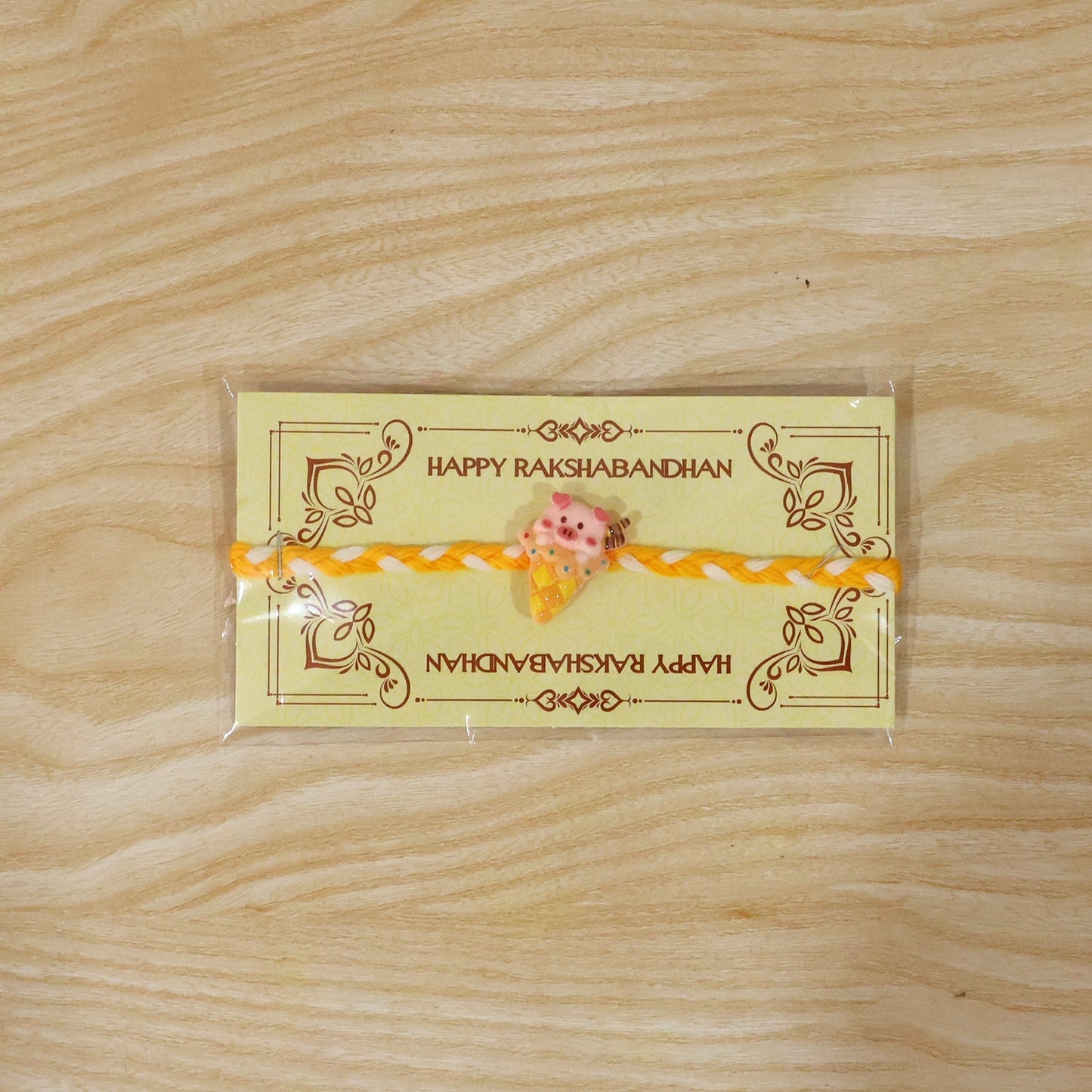 Lightweight Cute Pig Rakhi demonstrating neat finishing and comfort.