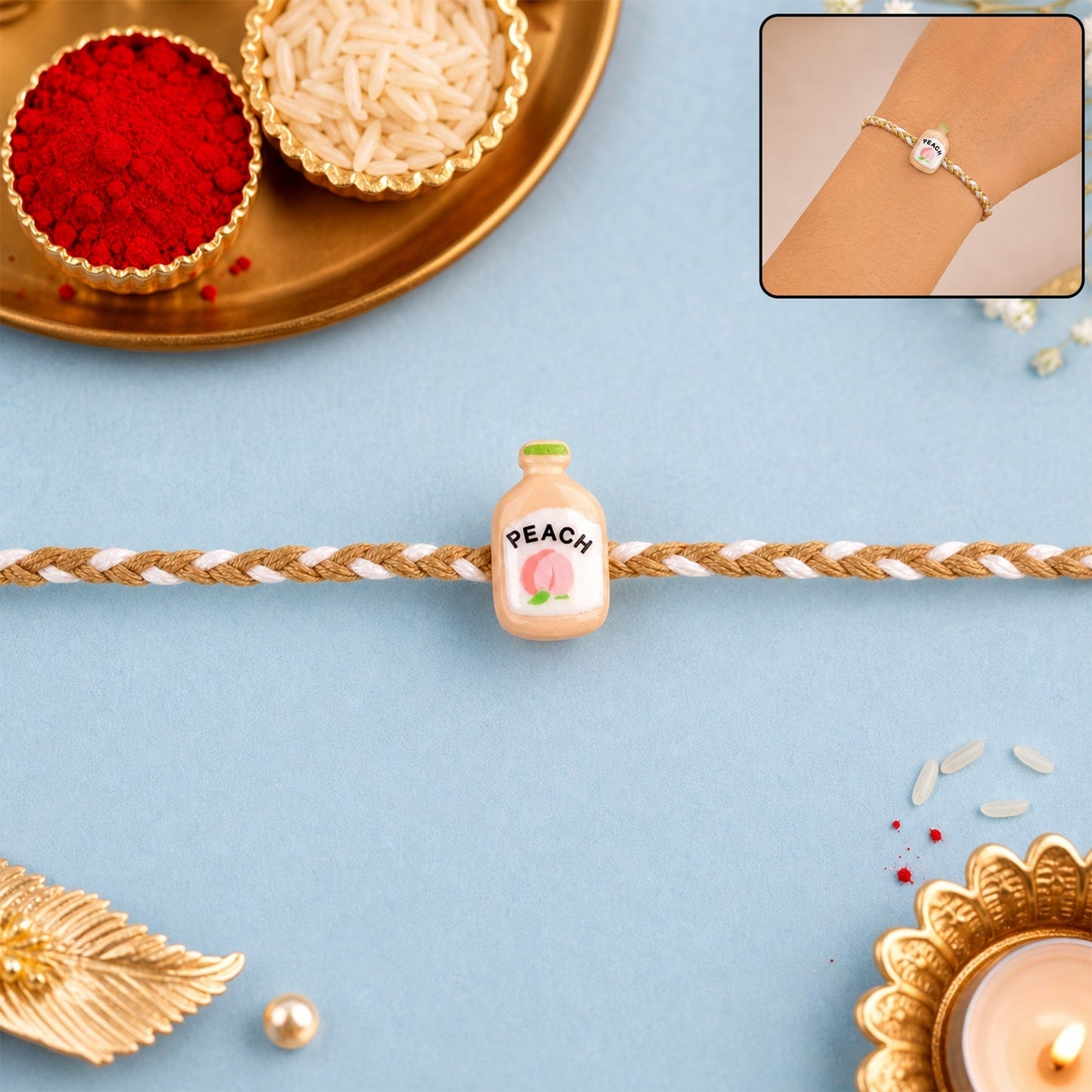 Front view of Peach Bottle Charm Fancy Dori Rakhi, stylish and colorful