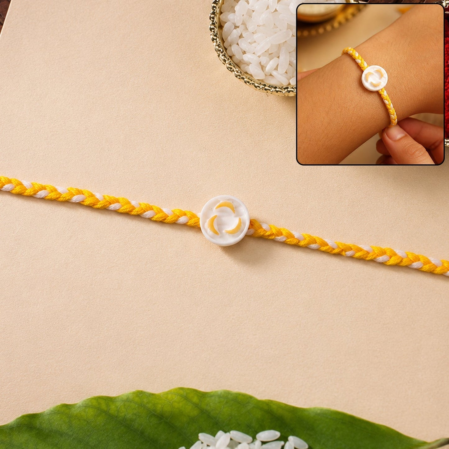 Front view of White Round Charm Fancy Dori Rakhi featuring a stylish design